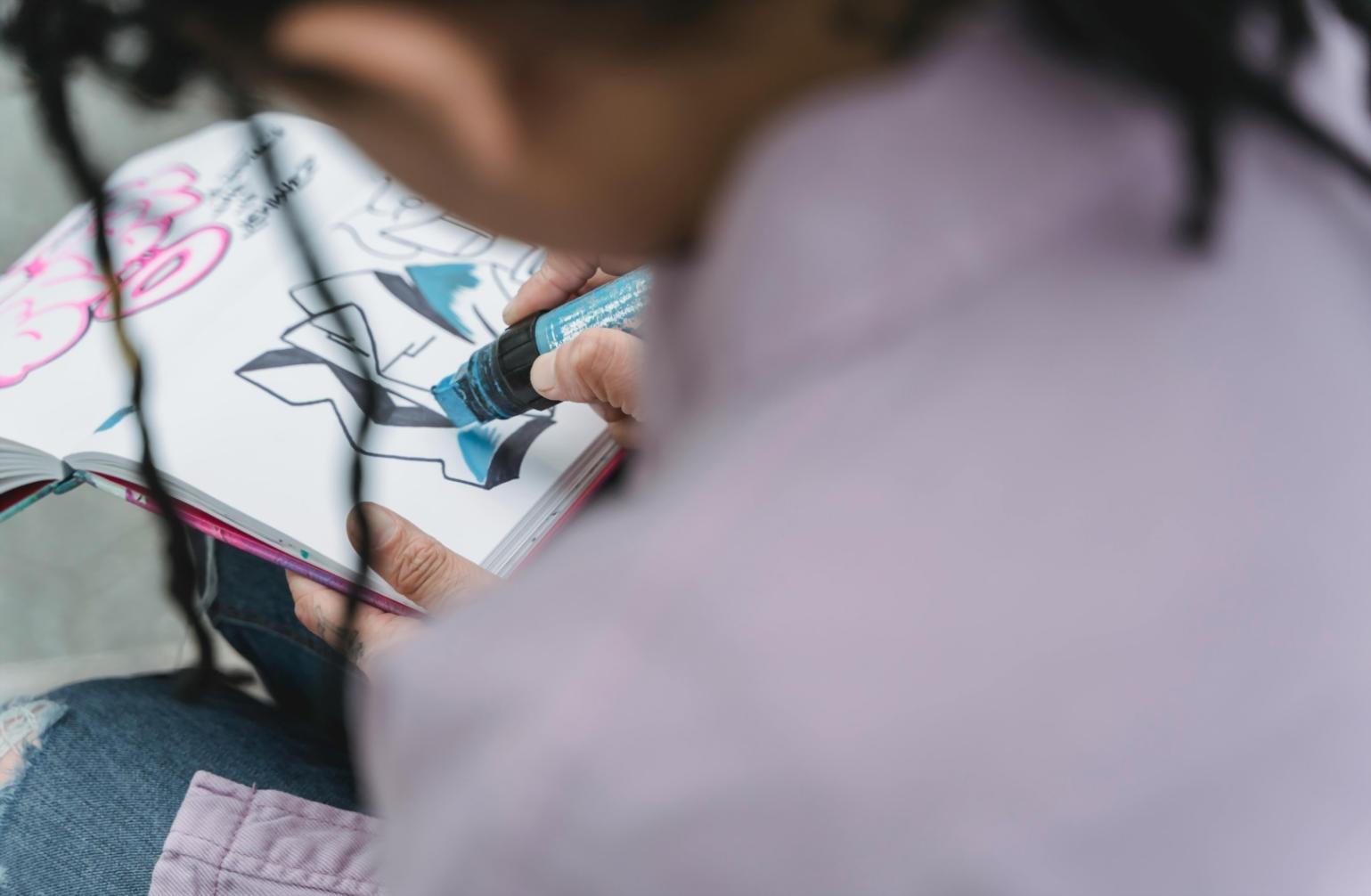 Creative workspace with sketches and digital art tools